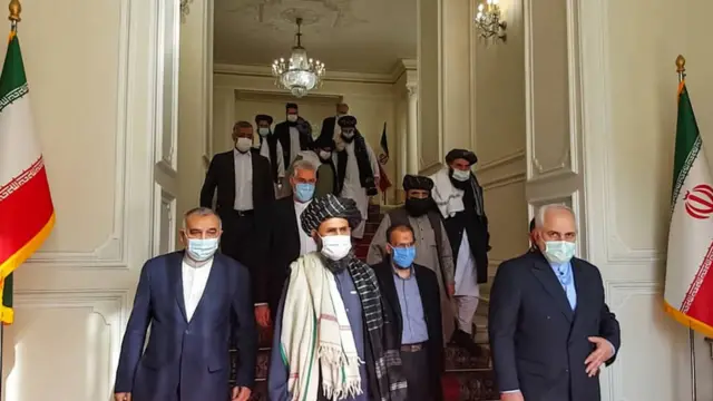 لقاء وزير الخارجية الإيراني محمد جواد ظريف مع الملا عبد الغني برادر من طالبان في طهران، في 31 يناير/كانون الثاني 2021