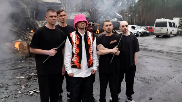 Kalush Orchestra on a photo-shoot in Irpin just weeks after the Russians withdrew