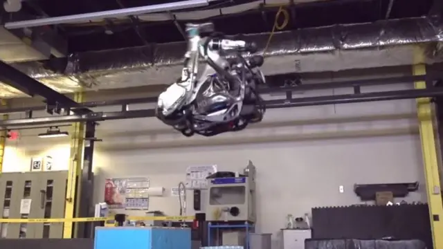 Atlas the robot mid backflip