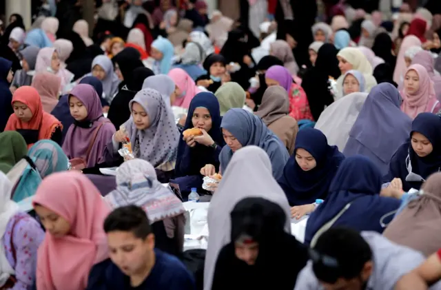 Women eating in Cairo, Egypt on April 8, 2022.