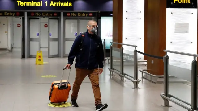 A passenger arrives at an airpot