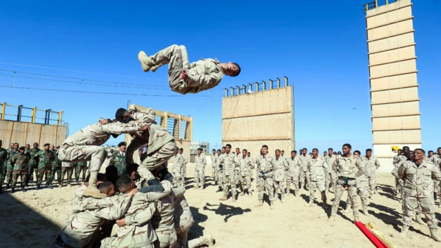 Cadets the "Saiqa" force of the self-styled Libyan National Army (LNA) take part in a graduation ceremony in Benghazi, Libya - Thursday 20 January 2022