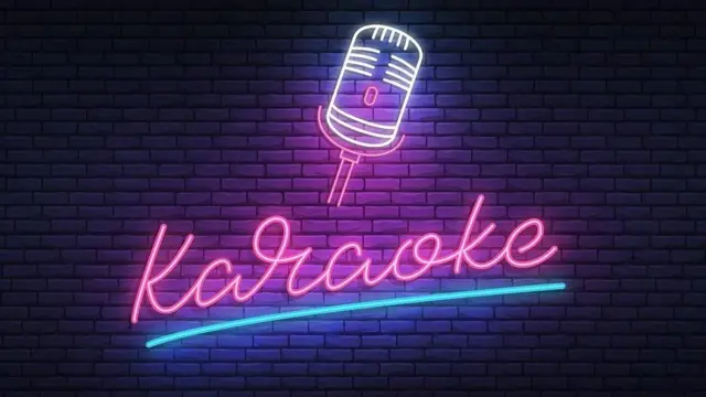 Anuncio luminoso que diz karaoke