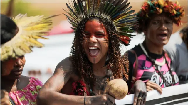 Pataxo indigenous people take part in a demonstration against violence and for land demarcation in Brasilia, on September 2022