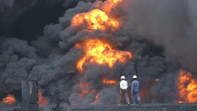 A fuel depot in flames during the Sri Lankan Civil War