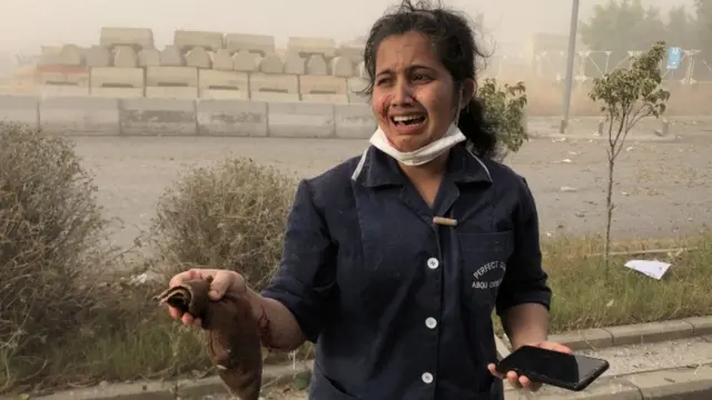 A person cries after witnessing the explosion in Beirut, 4 August 2020