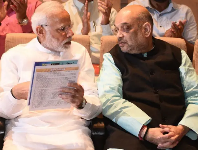 નરેન્દ્ર મોદી અને અમિત શાહ