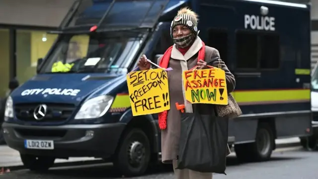 Supporters of Mr Assange gather for outside Old Bailey on Monday morning