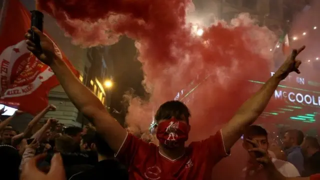 Liverpool fan wearing a mask