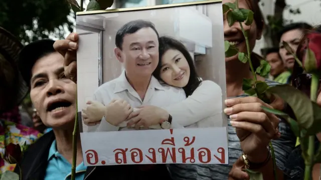 یینگلاک و تاکسین شیناواترا