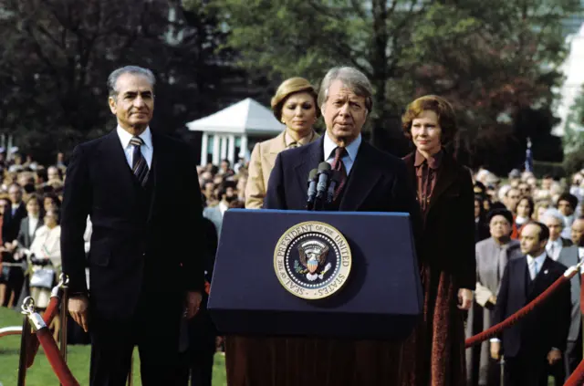 شاه إيران محمد رضا بهلوي والرئيس الامريكي الاسبق جيمي كارتر
