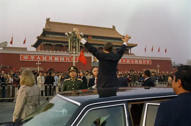 George Bush Waving to Chinese Onlookers