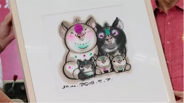 رسم كرتوني صيني حول سياسة الإنجاب