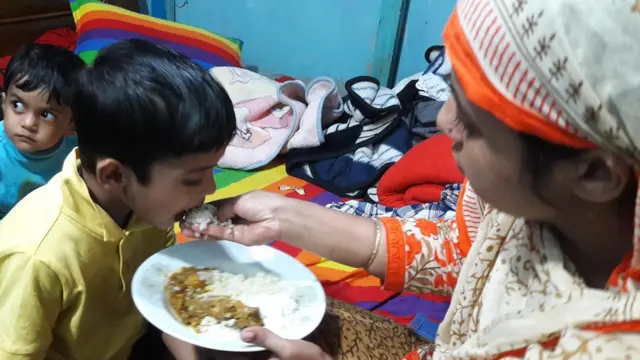 ফিরে আসার পর মায়ের হাতে খাবার খাচ্ছে জারিফ।
