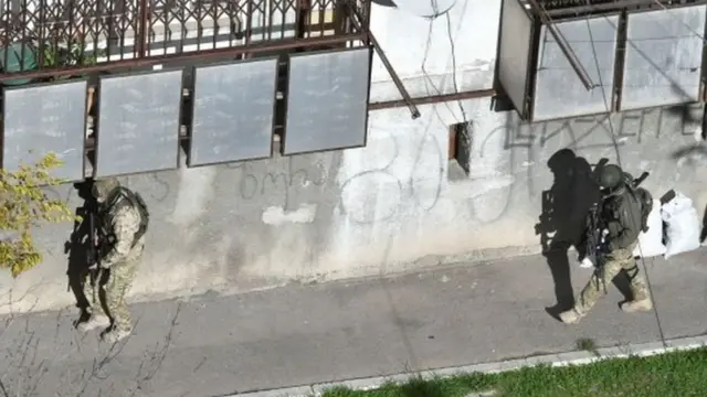 Members of Georgian security forces at the scene of the stand-off in Tbilisi (22 November 2017)