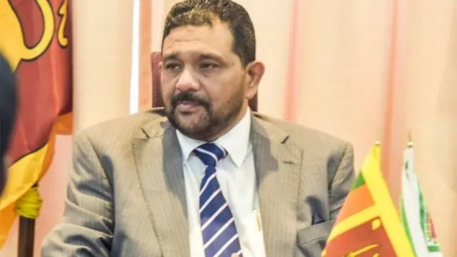 தேசிய ஐக்கிய முன்னணியின் தலைவருமான