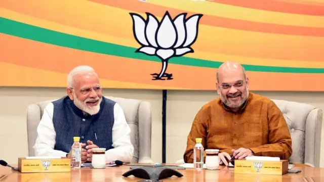 மோதி, ஷா