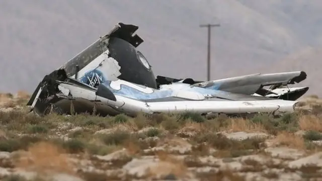 A piece of debris with the Virgin Galactic brand on it is seen near the scene of the crash of Virgin Galactic"s SpaceShipTwo near Cantil
