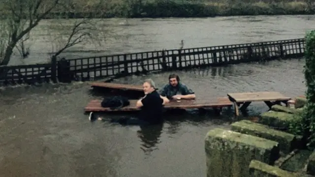 Leeds pub garden floods, men go for pint anyway - BBC News