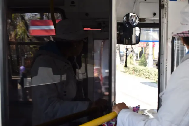 автобус жүргүнчүлөрү