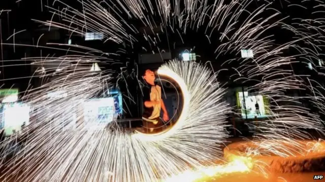 Boy enjoying fire works