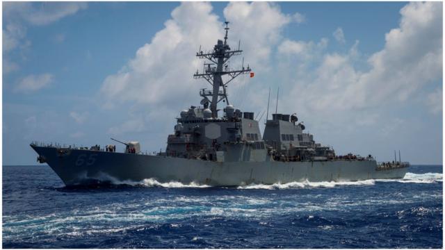 The Arleigh Burke-class guided-missile destroyer USS Benfold, forward-deployed to the U.S. 7th Fleet in the Indo-Pacific region, transits the Philippine Sea, June 14, 2018. Picture taken June 14, 2018. Sarah Myers/U.S. Navy/Handout via REUTERS