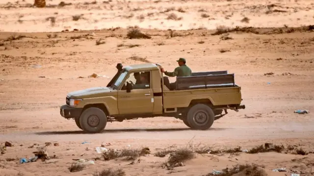 A vehicle of the royal Moroccan armed forces is seen on the Moroccan side of border crossing point between Morocco and Mauritania in Guerguerat located in the Western Sahara, on November 25, 2020.