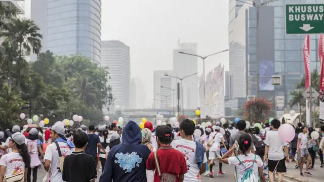 Crowd of people at the Bundaran HI square in the city center