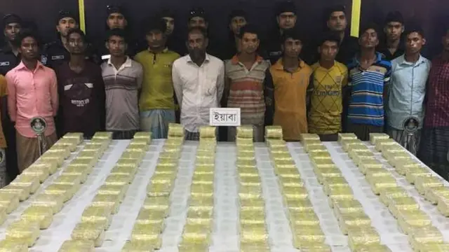 র‍্যাবের হাতে আটক মাদক পাচারকারী দল।