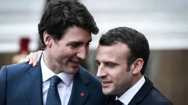 जस्टिन ट्रूडो और इमैनुएल मैक्रों