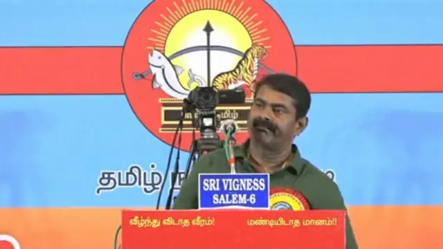 சீமான் பேசும் மேடையில் மூவேந்தர் சின்னம் பொறித்த கொடி