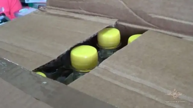 Caja con la loción venenosa