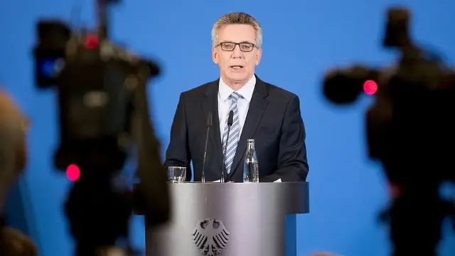 German Interior Minister Thomas de Maiziere attends a press conference in Berlin, on December 15, 2016 o