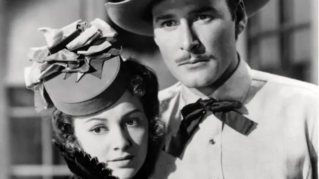 De Havilland with Errol Flynn in Dodge City (1939)