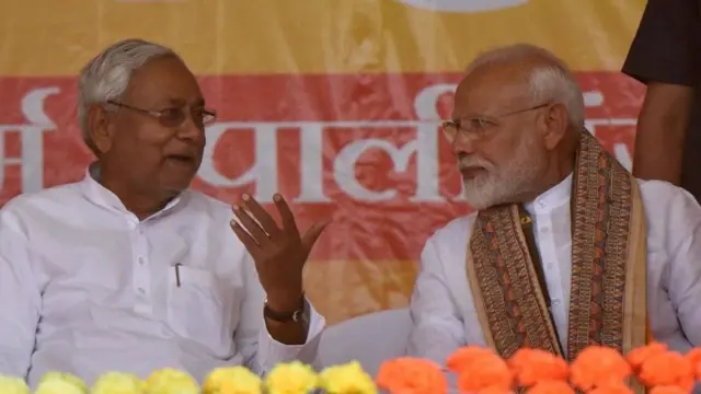 નિતીશ કુમાર અને નરેન્દ્ર મોદી