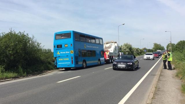 Twenty hurt in school bus lorry crash on Dunstable road