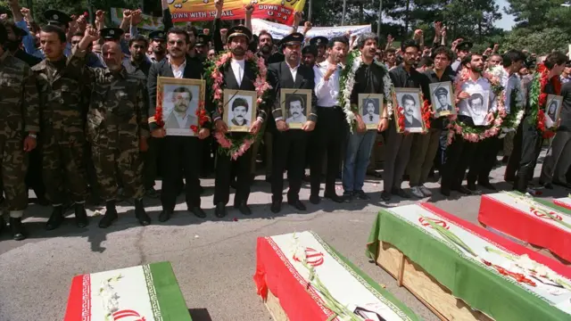 নিহতদের কফিনের সামনে শোকার্ত স্বজনরা