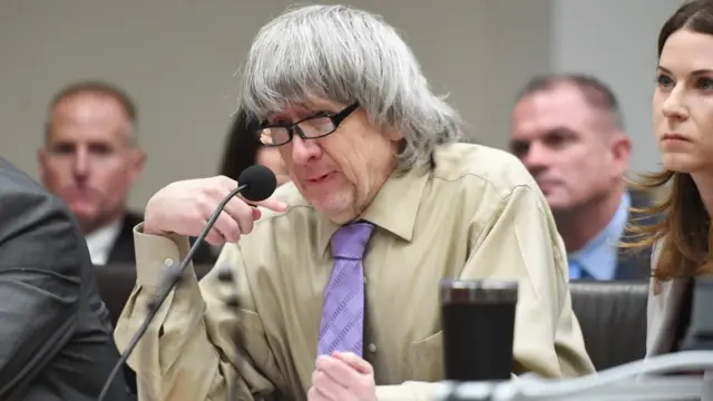 David Turpin, who pleaded guilty with his wife Louise to 14 felony counts for the abuse over several decades of their 13 children, addresses the court during their sentencing in Riverside, California on April 19, 2019