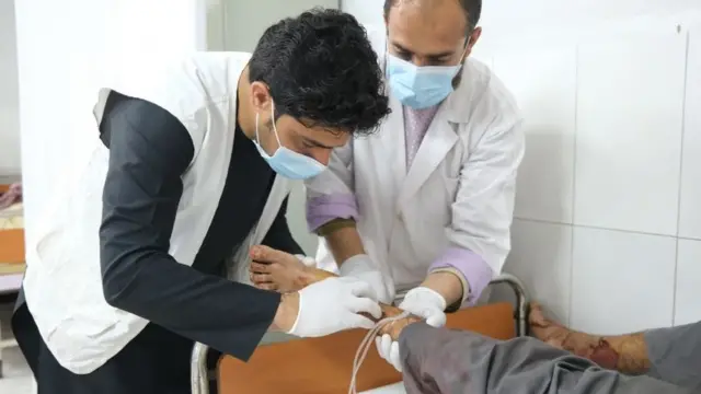 A doctor treating the war injured