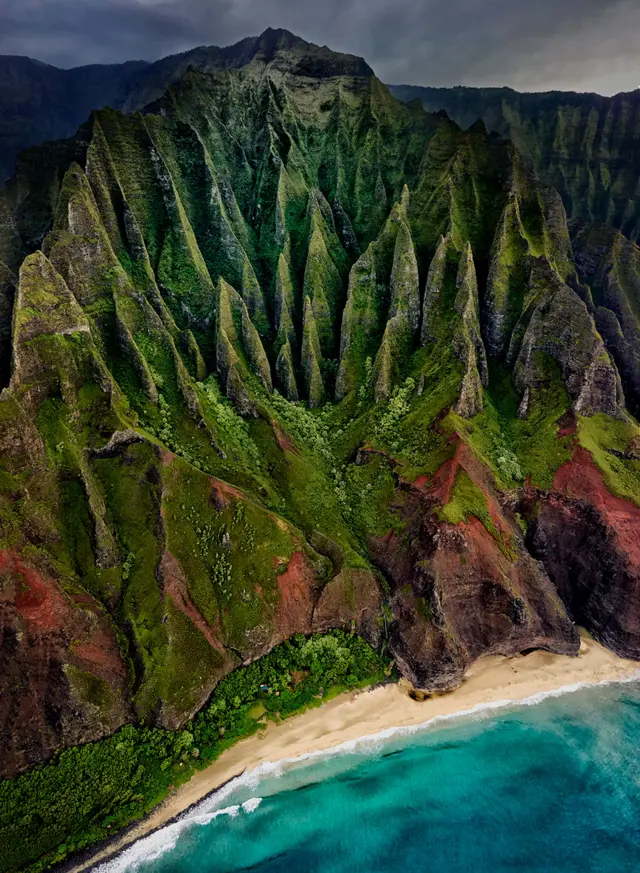 An aerial view of a mountainous coast in Kauai Island, Hawaii, US