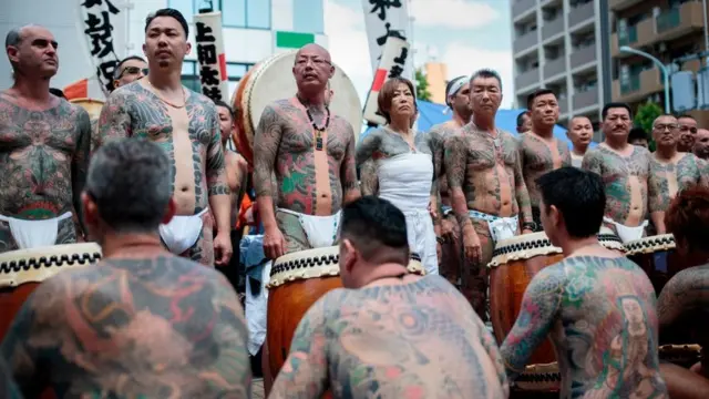 Participantes do festival Sanja Matsuri,cassino pagando bonusTóquio