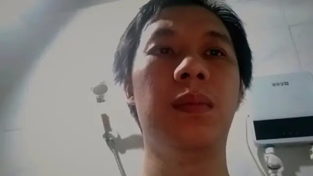 Chinese man doing selfie video