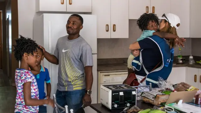 Ms Lapierre and her sister meet with a family of Congolese refugees in Saint-Jerome