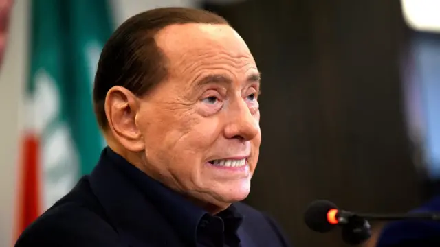 Italy's former prime minister, Silvio Berlusconi, speaks at a news conference in support of Forza Italia