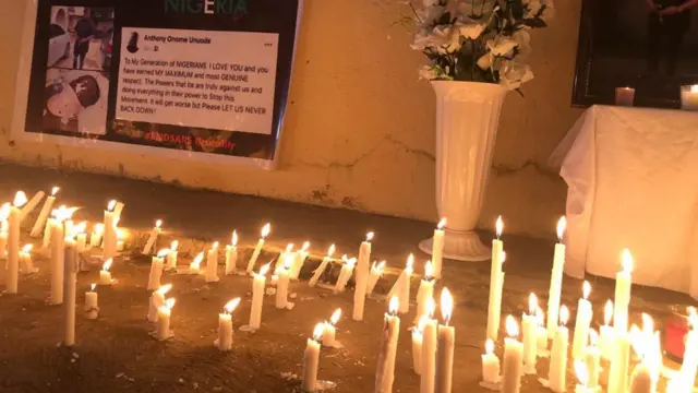 Lit candles on the floor