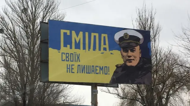 Білборд на підтримку одного із захоплених українців - капітана буксиру "Яни Капу" Олега Мельничука