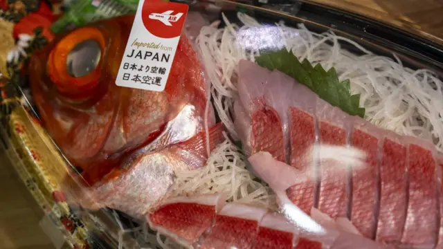 A label saying import from Japan on a box of raw fish inside a fridge at a supermarket on July 12. 2023 in Hong Kong, China. The head of Hong Kong Environmental Department said that if Japan releases nuclear waste waters into the sea, the city will ban seafood imports from 10 Japanese prefectures. (Photo by Vernon Yuen/NurPhoto via Getty Images)