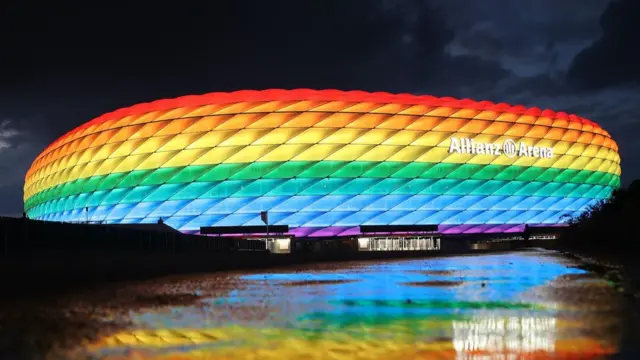 Allianz Arena lit up in rainbow colours