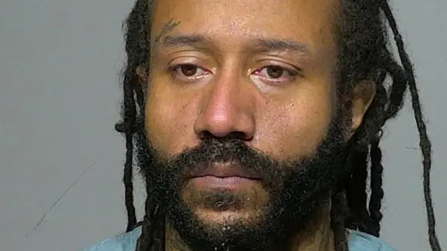 Darrell Brooks poses for a booking photograph at the Milwaukee County Jail