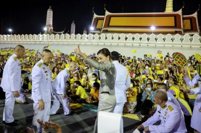 Thailand"s King Maha Vajiralongkorn and Queen Suthida greet royalists, at The Grand Palace in Bangkok, Thailand, November 1, 2020.
